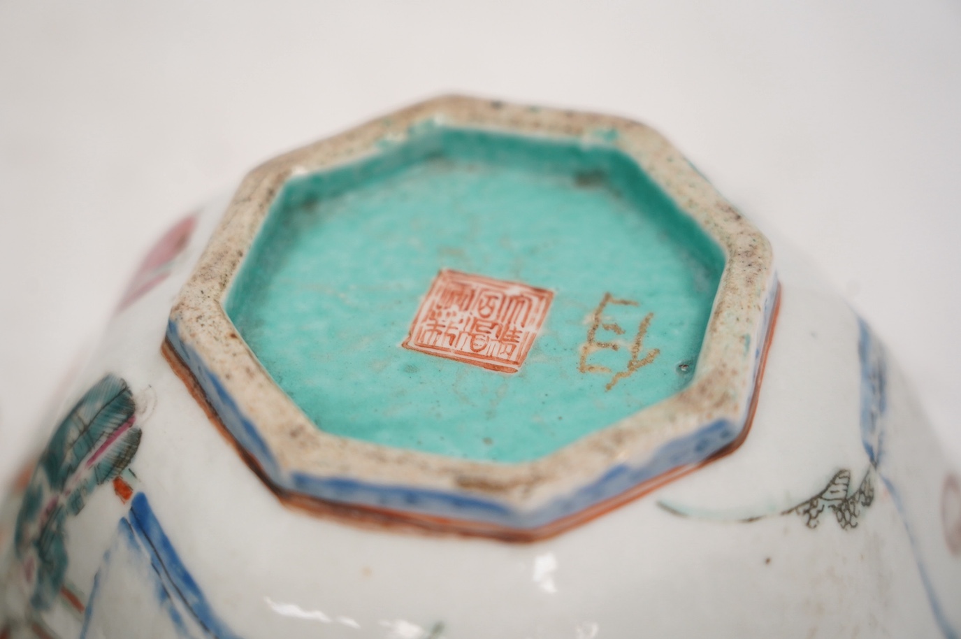 A Chinese famille rose octagonal bowl and another, both Tongzhi mark and period (1862-1874), largest 16cm wide. Condition - rectangular dish is damaged, bowl is fair, chip to the top rim